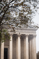 Monumental columns of the Madeleine church from the front and under the snow - Paris 5
