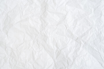 Top view and full frame of wrinkled or crumpled white paper texture used as crumpled white paper background texture in decorative art work