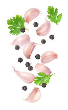 set of garlic with parsley leaf isolated on white background.