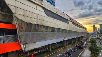 a view of a city street with a large building