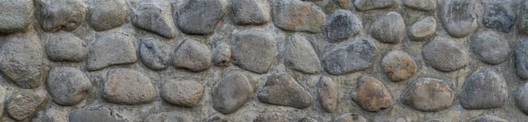 A close up-high resolution image of stone wall texture