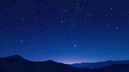 Fototapeta premium Serene Night Sky Over Silhouetted Mountain Range, Starry Expanse Above Dark Peaks