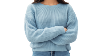 Powder Blue Knitwear: Close-up of a woman wearing a stylish powder blue knit sweater, arms crossed, showcasing the soft texture and comfortable fit of the garment. 
