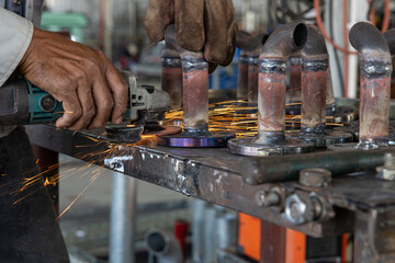 Metal Grinding Sparks in Industrial Workshop