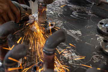 Metal Grinding Sparks in Industrial Workshop