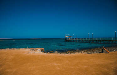 Obraz premium Rocks and corals in sea blue water. Landscape of Egypt on vacation