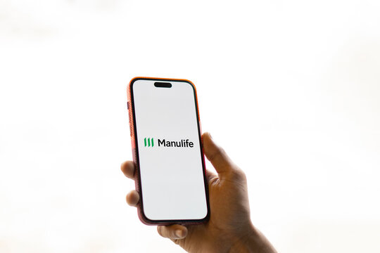 Dhaka, Bangladesh- 10 Nov 2024: Manulife logo is displayed on smartphone. Manulife Financial Corporatipon is a Canadian multinational insurance company.
