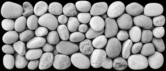 Smooth gray stones arranged in a textured pattern