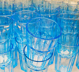 Background from glass glasses. Blue glasses