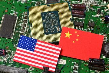 Flag of the Republic of China and USA on a pc motherboard with a CPU. Concept for supremacy in global microchip and semiconductor manufacturing. Italy