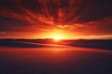 Fototapeta premium A dramatic sunset casting long shadows over a desolate desert landscape.