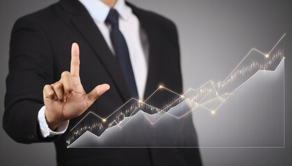 비즈니스 정장을 입은 남성의 손위에 떠있는 주식차트