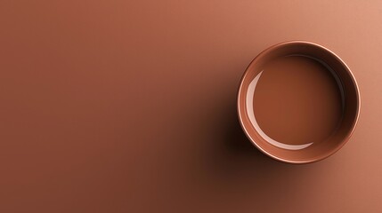 Top view of a cup with a colored mocha mousse on the background of a wall of color mocha mousse. Color trend.