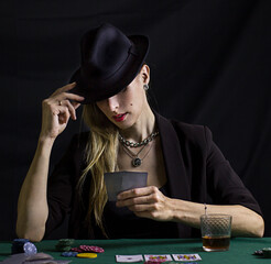 person with poker cards