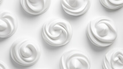 Whipped cream swirls on a white background with ample Copy Space for text placement