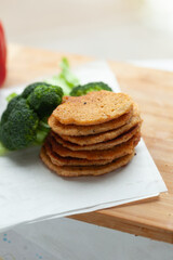 Stack of savory pancakes with broccoli. A healthy and delicious meal or snack.