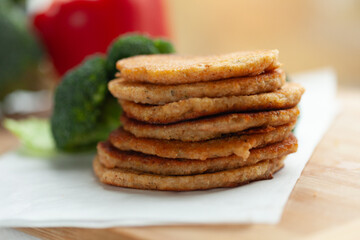 A stack of golden-brown pancakes, ready to be enjoyed.  A healthy and delicious treat.