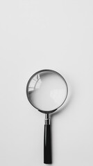 Metallic magnifying glass on white background