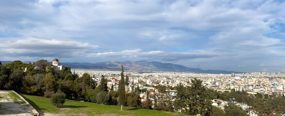 Athens, Greece. Parthenon, Acropolis hill and mount Lycabettus view from Areopagus hill