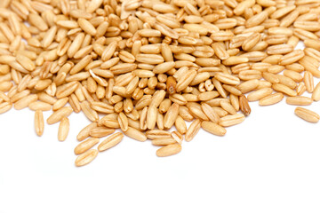 dried organic whole grain oats isolated white background