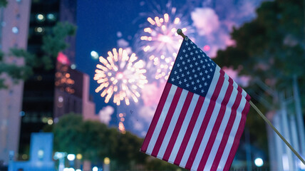 American flag waving with vibrant fireworks display in the night sky