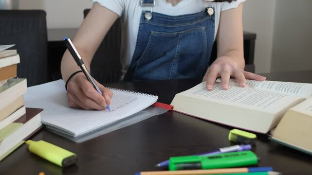 Student summarizing book 