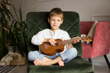 boy playing guitar