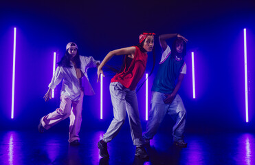 Group of hip hop dancer dancing together.