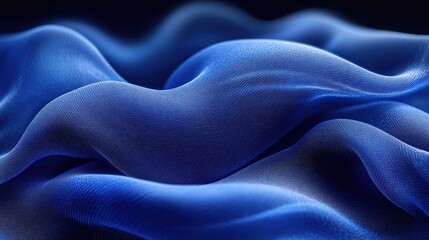 Obraz premium Flowing blue fabric waves create a serene background, enhancing the sense of tranquility and elegance