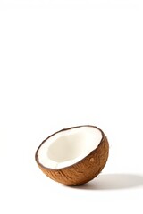 there is a half of a coconut on a white surface