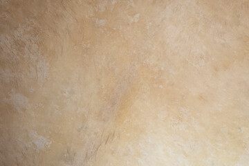Beige colored leather texture or background