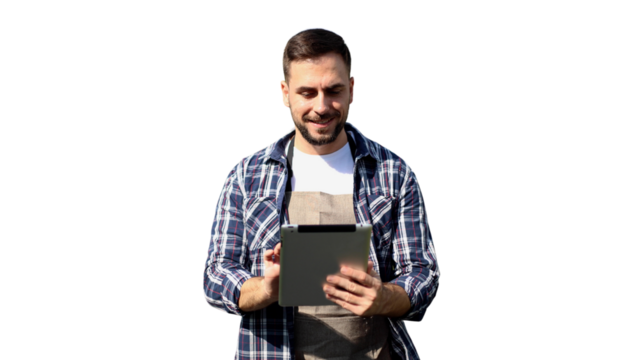 Worker is caring for the plants at the garden center	