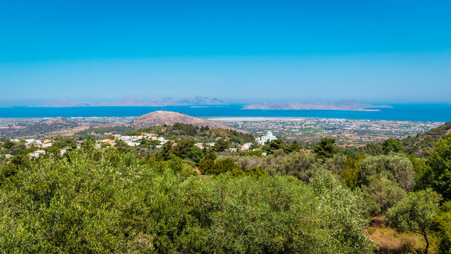 Panoramic view of Kos island with village Tigaki and island of Kalymnos and Pserimos in the distance, Kos island, Greece