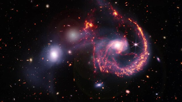 Rotating interacting galaxies Arp 107 animation in outer space. Animation based on image by nasa