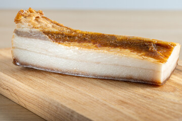 Piece of cured pork belly, a traditional Romanian delicacy called 