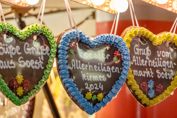 Three heart-shaped cookies with different colors Allerheiligen Kimes Soest