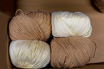 brown shades skeins of thread for handicrafts. fashionable color of the year