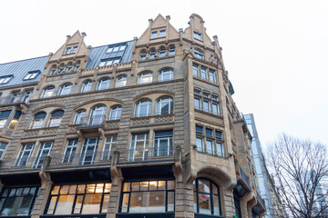 A view of a historic building in Frankfurt am Main, Germany, featuring ornate facade details characteristic of Historicist or Art Nouveau (Jugendstil) architecture