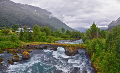 Olden Norway 2024 hiking views towards Briksdal Glacier, Jostedal Glacier largest glacier on Europe's mainland. Glacial river flowing to Sognefjord. Scandinavia, Nordic.