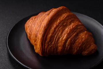 Sweet fresh crispy croissant with chocolate filling