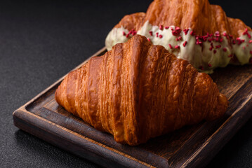 Sweet fresh crispy croissant with chocolate filling