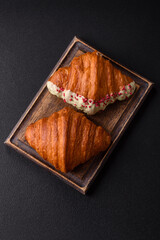 Sweet fresh crispy croissant with chocolate filling