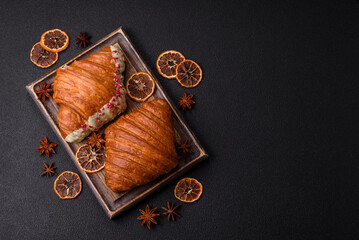 Sweet fresh crispy croissant with chocolate filling