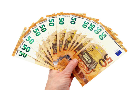 Money notes of 50 euros in a hand isolated on a white background. Financial concept. European cash money.