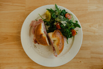 Bagel sandwich with side salad