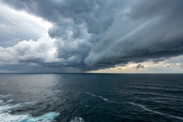 Fototapeta premium Panoramic scene of vast endless ocean stretching out to the horizon under cloudy sky