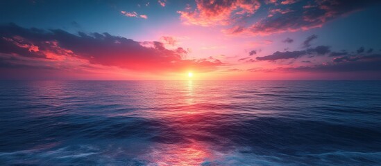 Vibrant sunset over calm ocean water. (1)