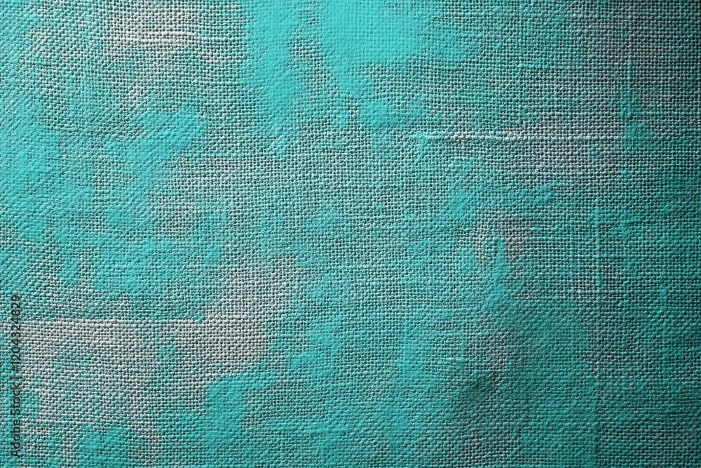 Poster close-up view of turquoise dyed burlap material, showcasing its unique texture and weave, ideal for 