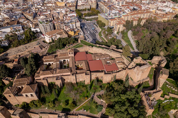 Castle La Alcazaba with lush green gardens at the edge of Mediterranean city Málaga in Spain seen...