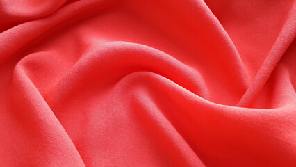 Red lightweight natural fabric for summer clothes. Batiste. Cotton. Texture of cotton fabric....